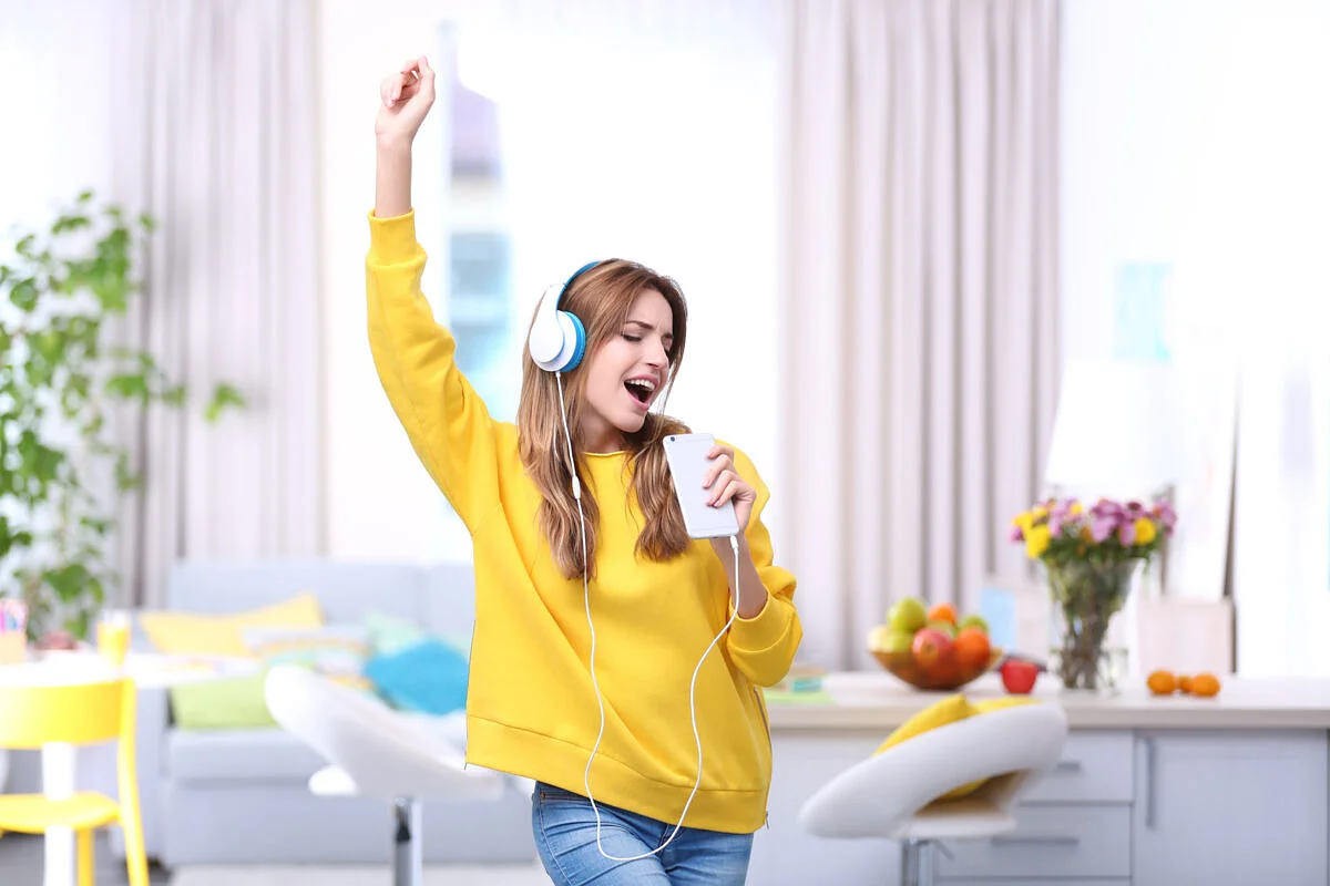 What all does the app with the sing-along videos have to offer?