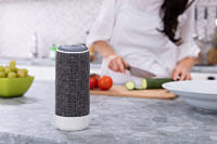Close-up Of Voice Assistant Speaker On Kitchen Counter