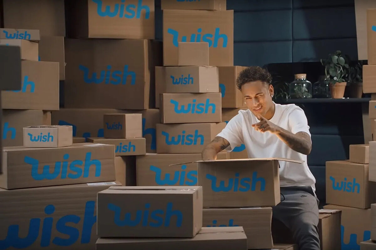 A still from a promotional video for Wish shows Brazilian football star Neymar opening boxes – part of the shopping app’s successful soccer World Cup marketing campaign.