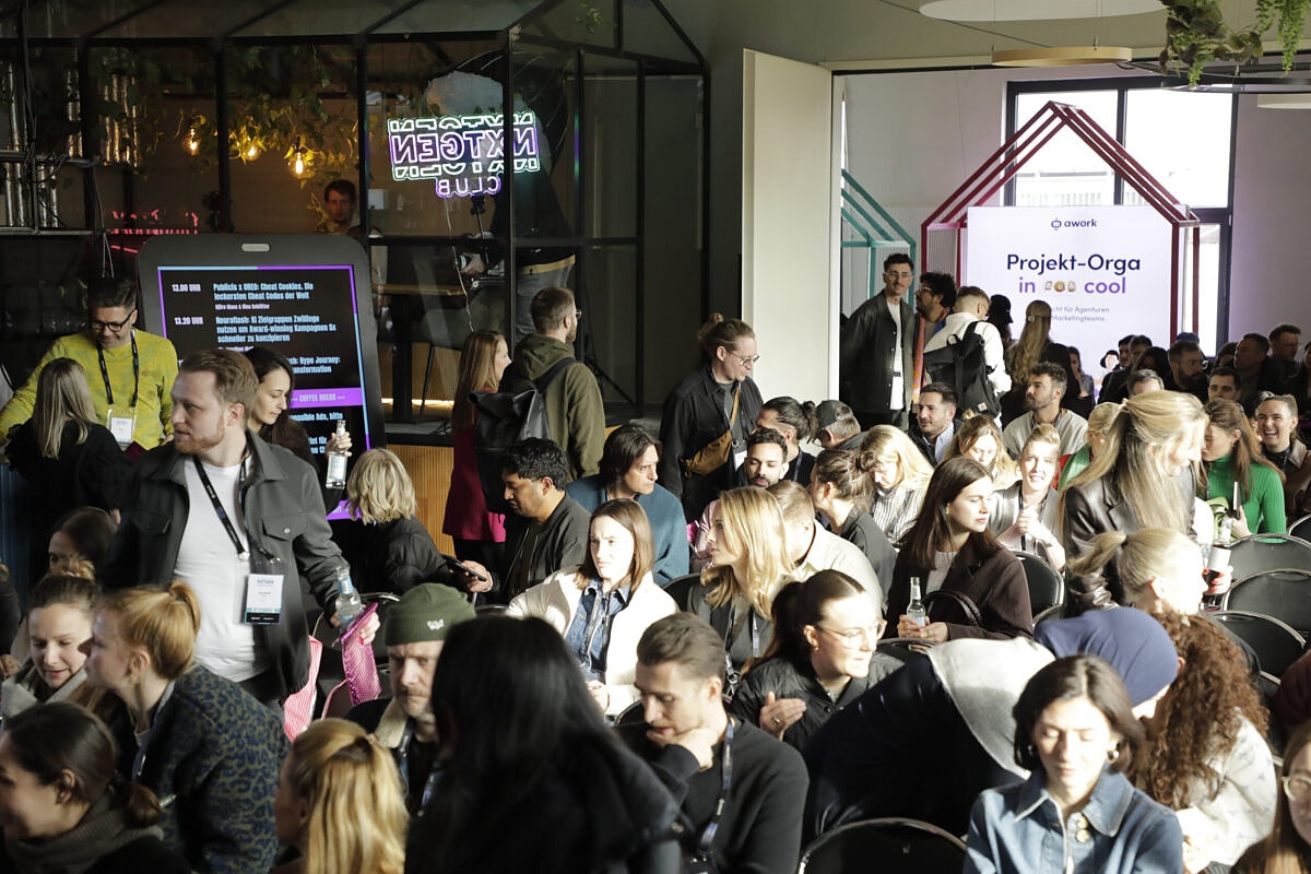 Attendees at NXTGEN Cases in Hamburg networking and exchanging ideas between brand and agency teams.